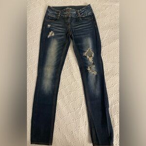 size 4, faded ripped jeans, double button